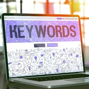 Keywords - Closeup Landing Page in Doodle Design Style on Laptop Screen. On Background of Comfortable Working Place in Modern Office. Toned, Blurred Image. 3D Render.-1-903336-edited.jpeg