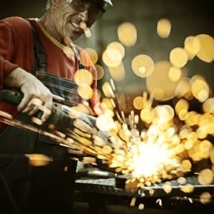 Industrial worker cutting and welding metal with many sharp sparks-727582-edited.jpeg